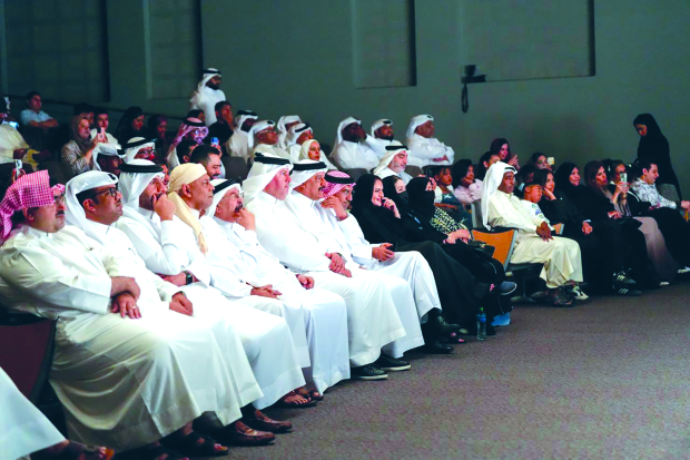 <p><em><strong>The audience enjoying the performance in rapt silence</strong></em></p>
